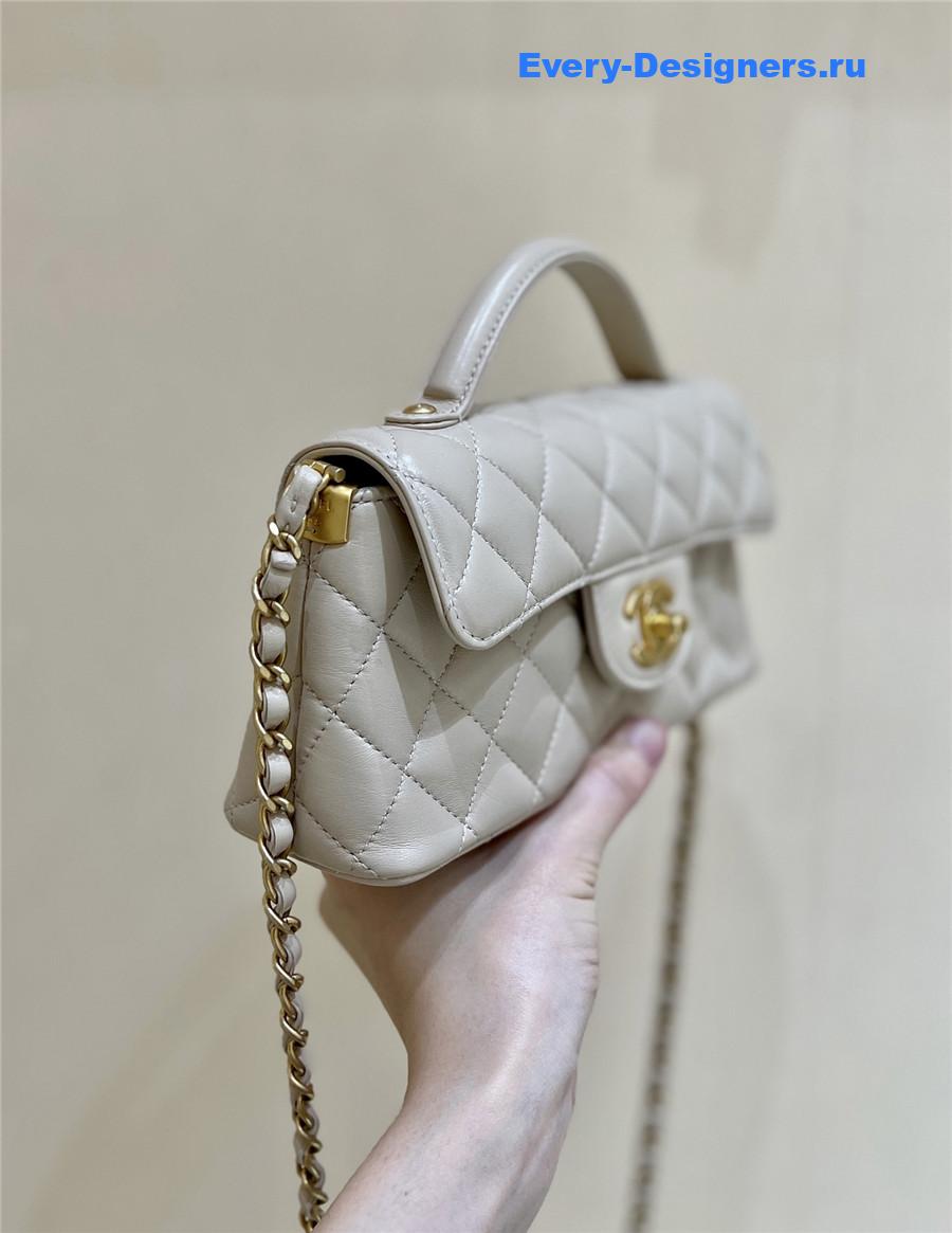 Ch**el beige lambskin top handle flap bag