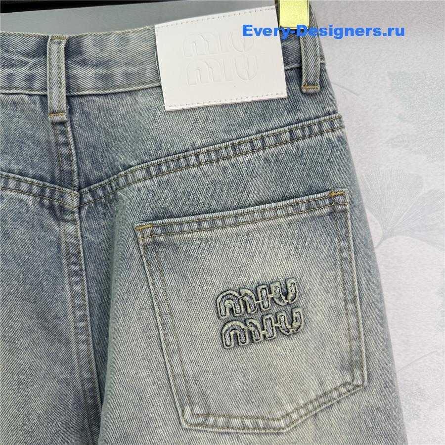 Miu Miu Badge Scimitar Wide-leg Jeans