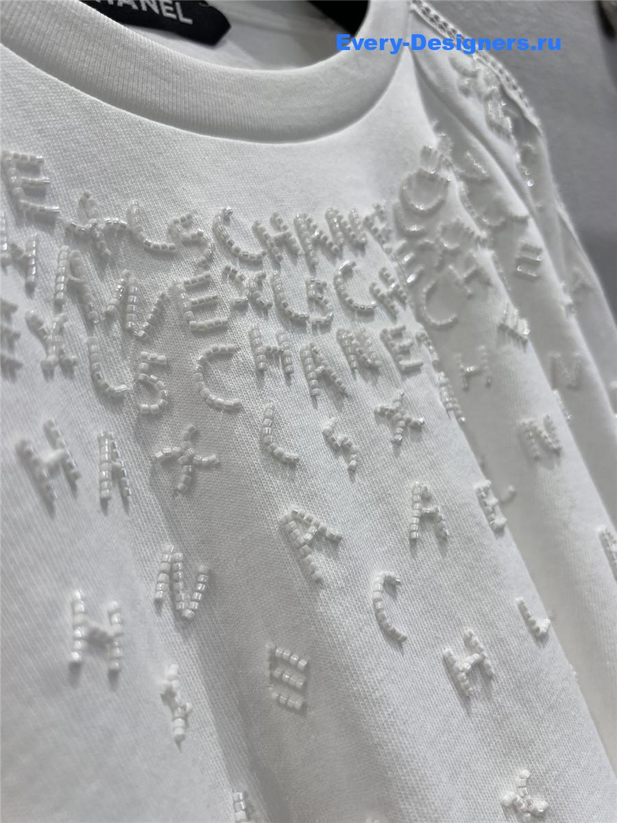 Ch**el logo beaded white cutout top