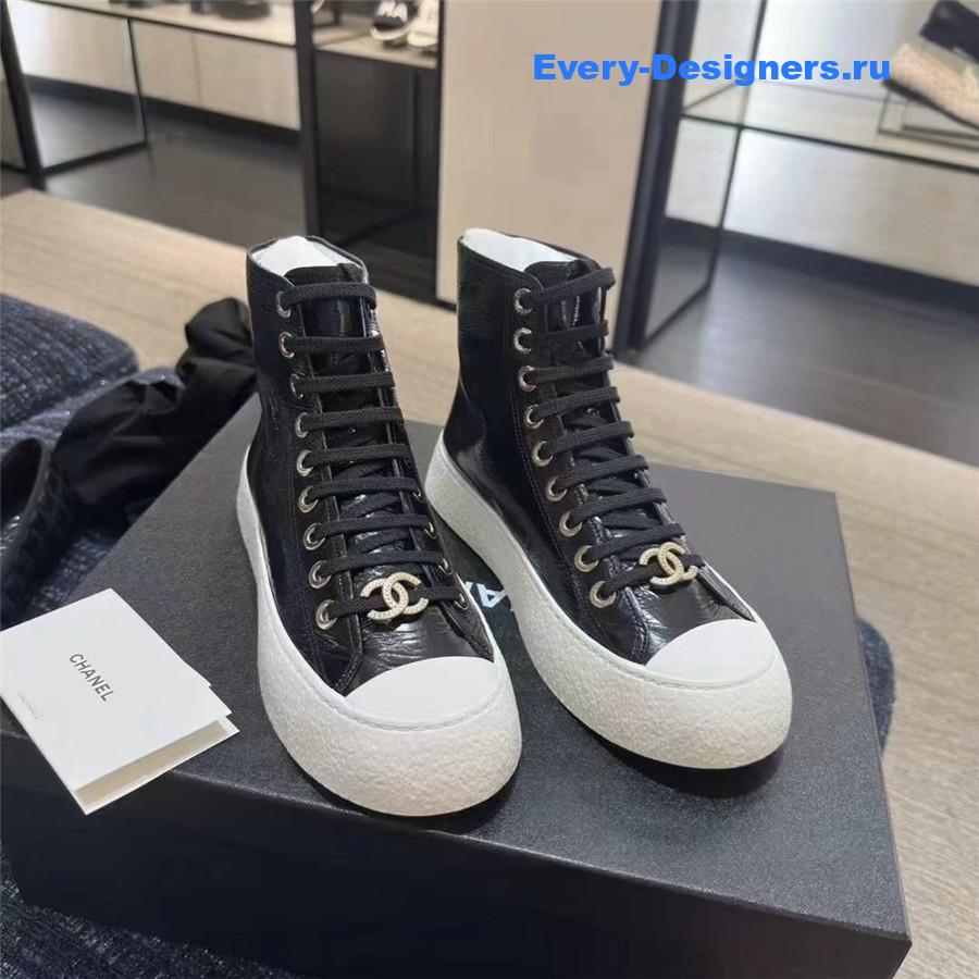 Ch**el high-top waxed leather lace-up sneakers