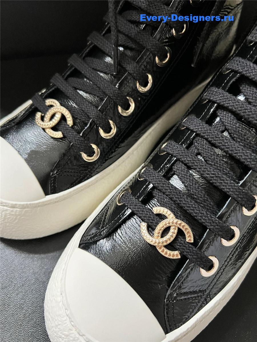 Ch**el high-top waxed leather lace-up sneakers