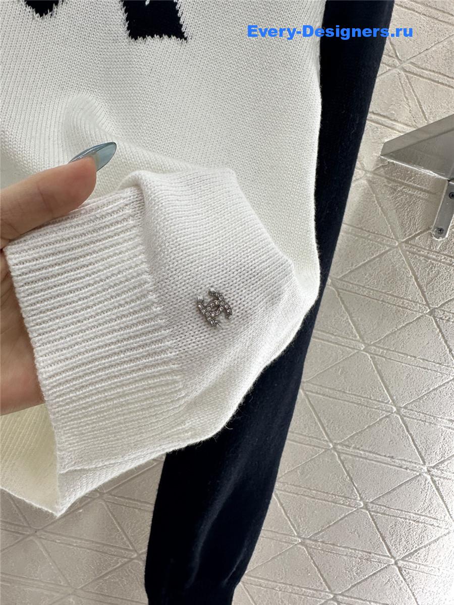 Ch**el white embroidered-bow sweater