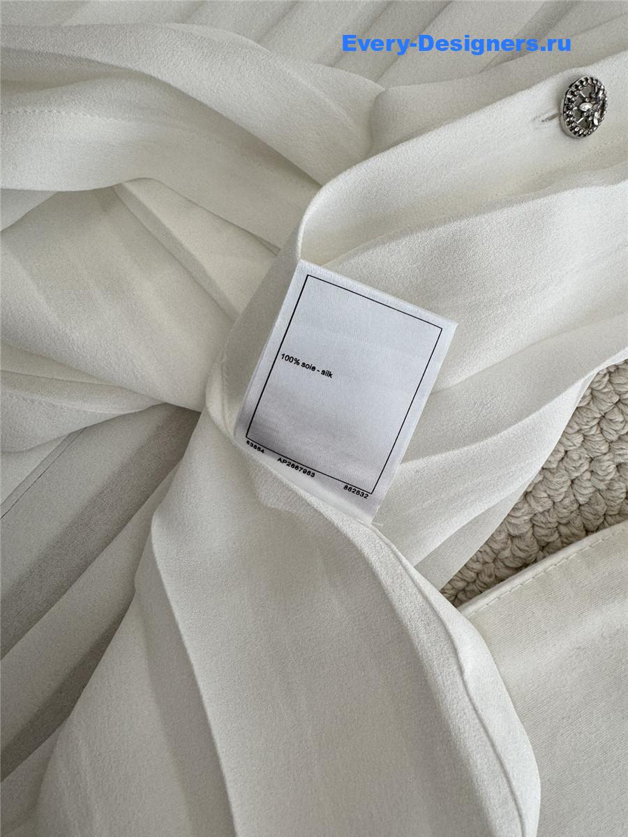 Ch**el white pleated sleeveless top