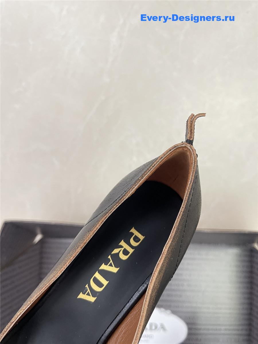 Pra*a black leather bow pumps