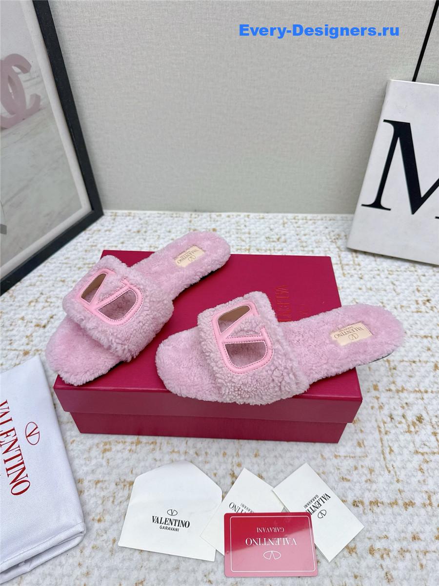 Va1e*ntin0 pink vlogo cutout faux shearling slides
