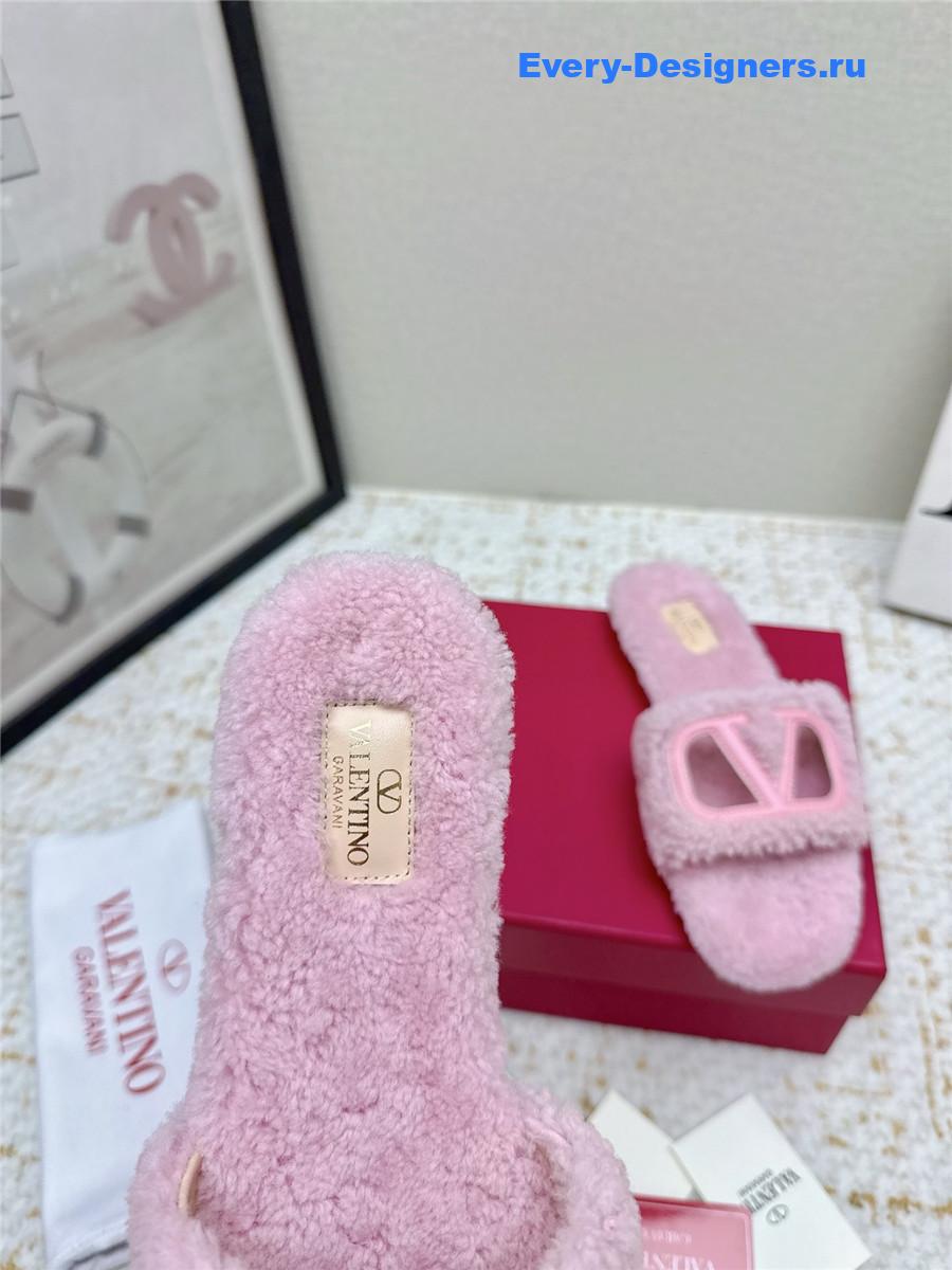 Va1e*ntin0 pink vlogo cutout faux shearling slides