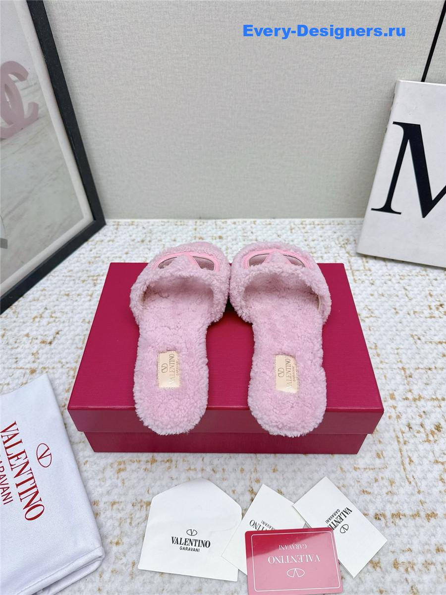 Va1e*ntin0 pink vlogo cutout faux shearling slides