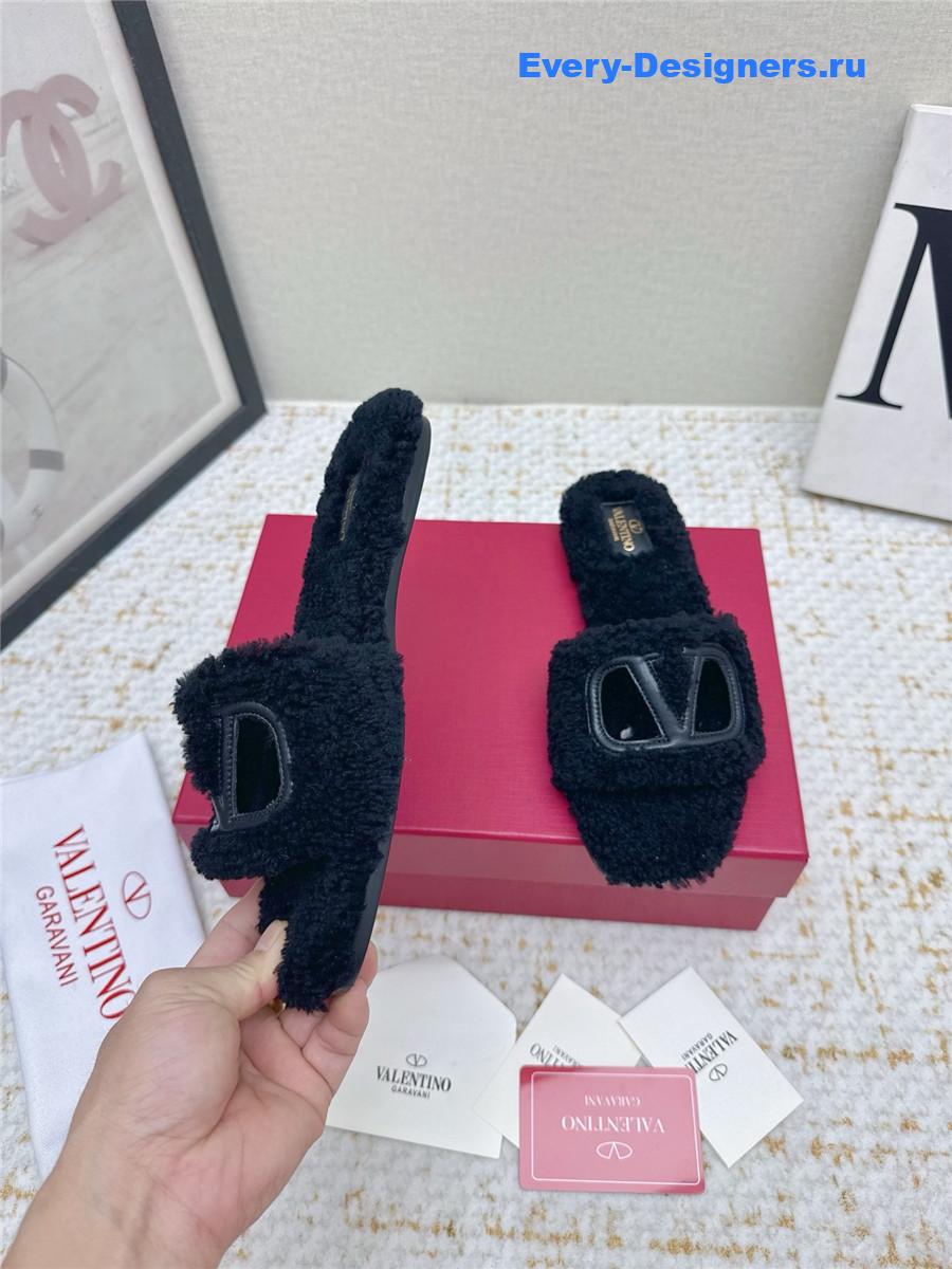 Va1e*ntin0 black vlogo cutout faux shearling slides
