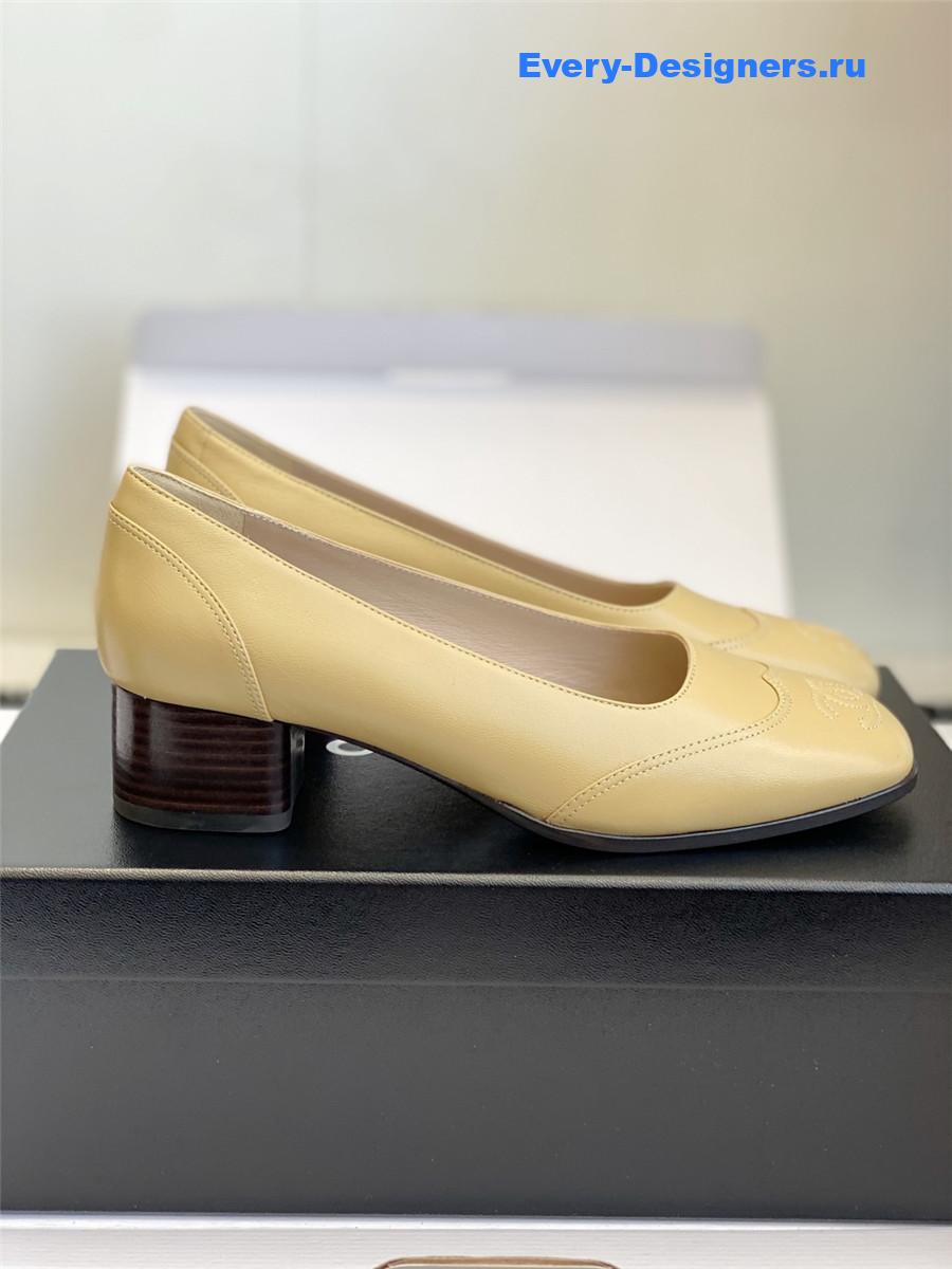 Ch**el beige cap toe block heel pumps